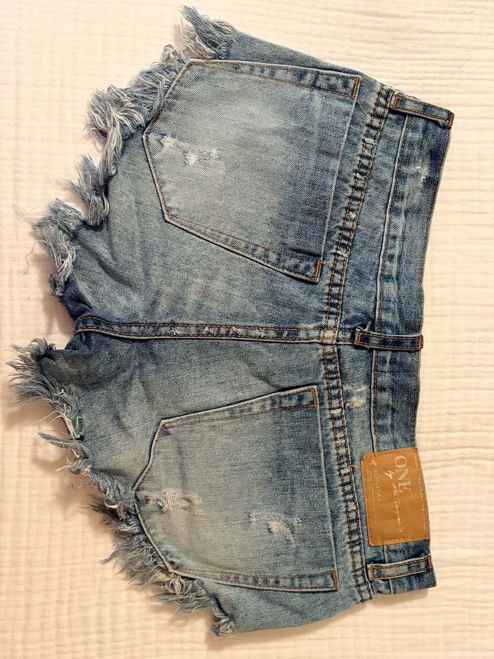 One Teaspoon Bonitas Low Waist Distressed Raw Hem Denim Shorts